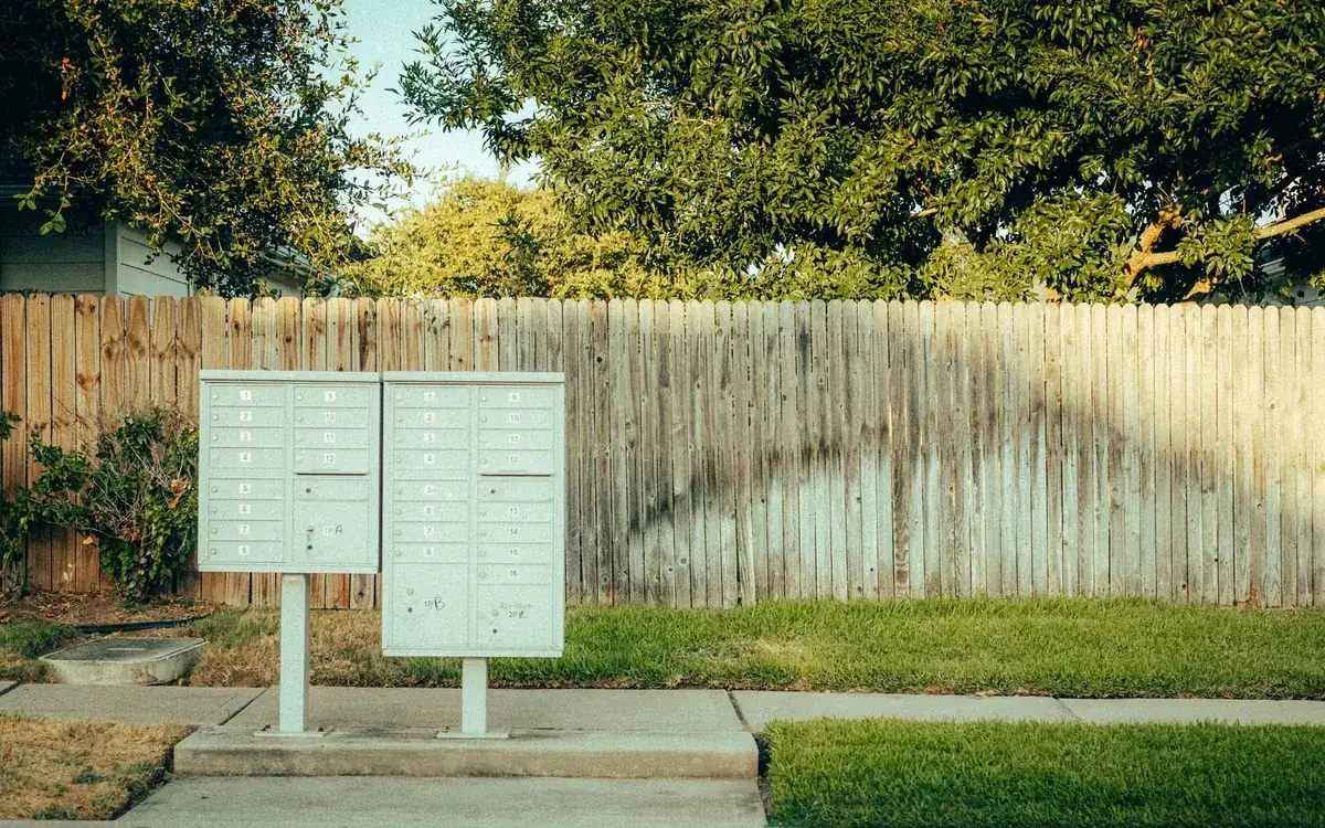 Wood privacy fence along a sidewalk, used to estimate fence cost in Ocala
