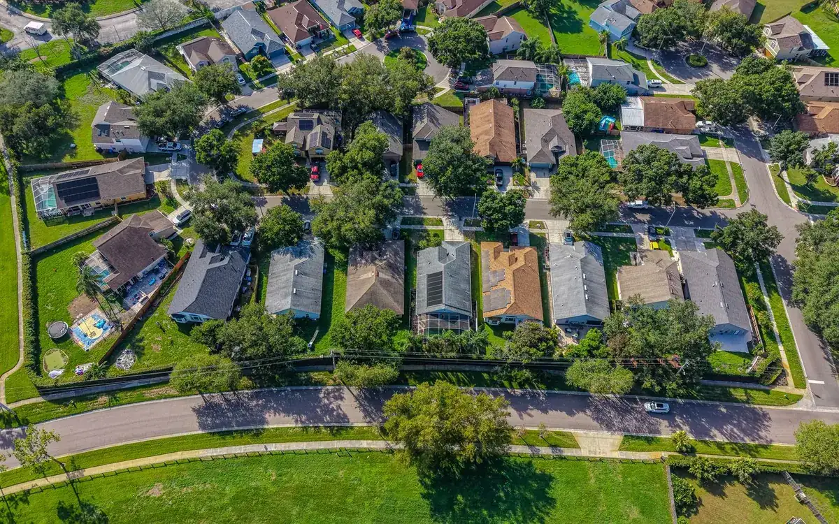 Aerial view of a Florida subdivision with fenced back yards, showing HOA fence rules in Ocala communities