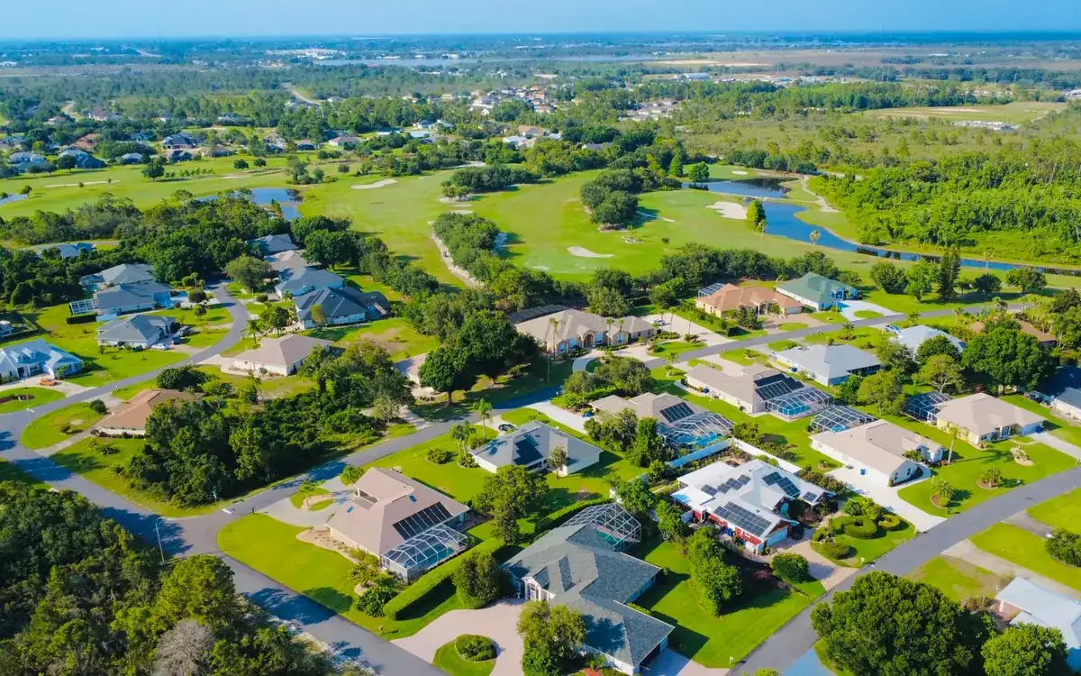 Aerial view of Florida neighborhoods with green space and ponds